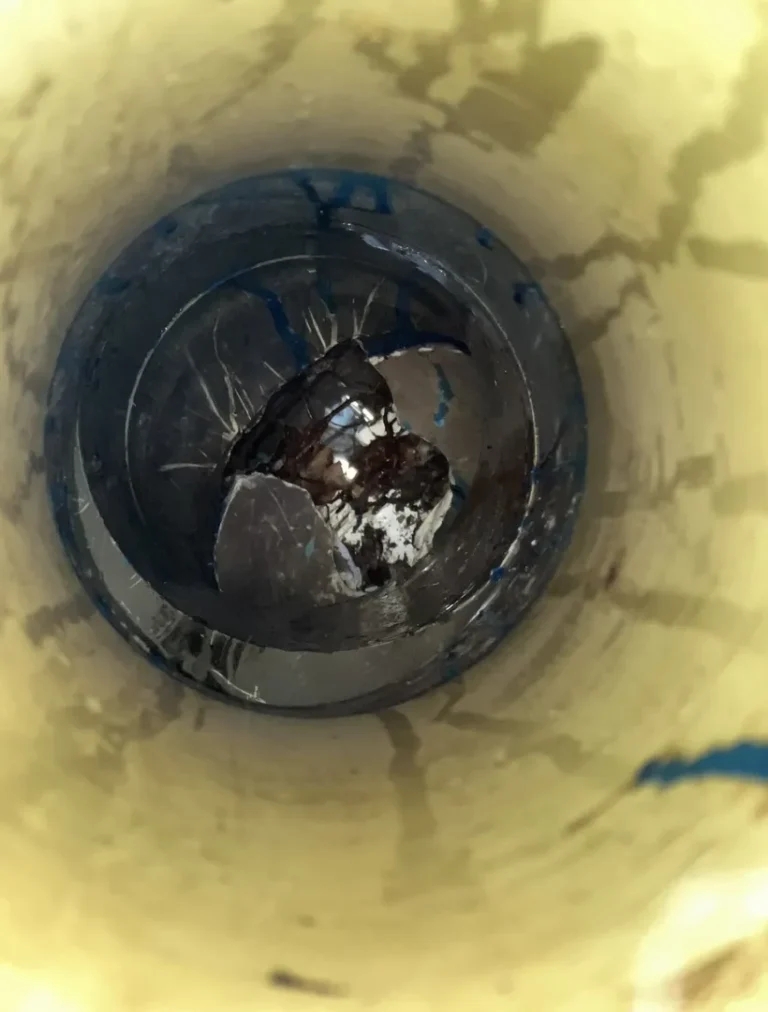Inside a pipe showing a blockage with a foreign object.